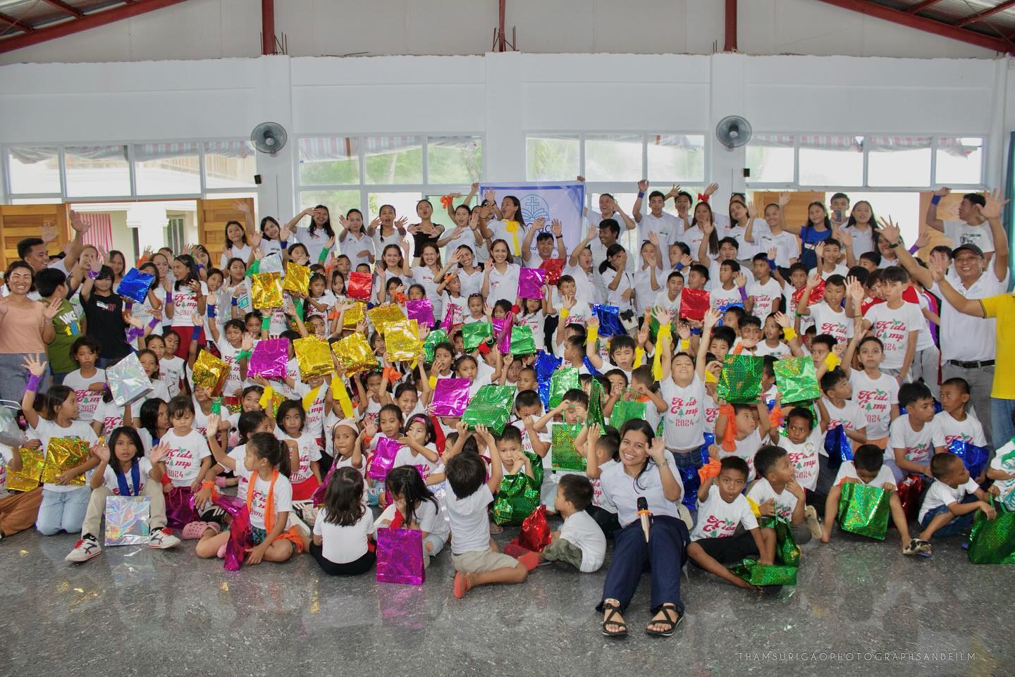 Large group of children at outreach event