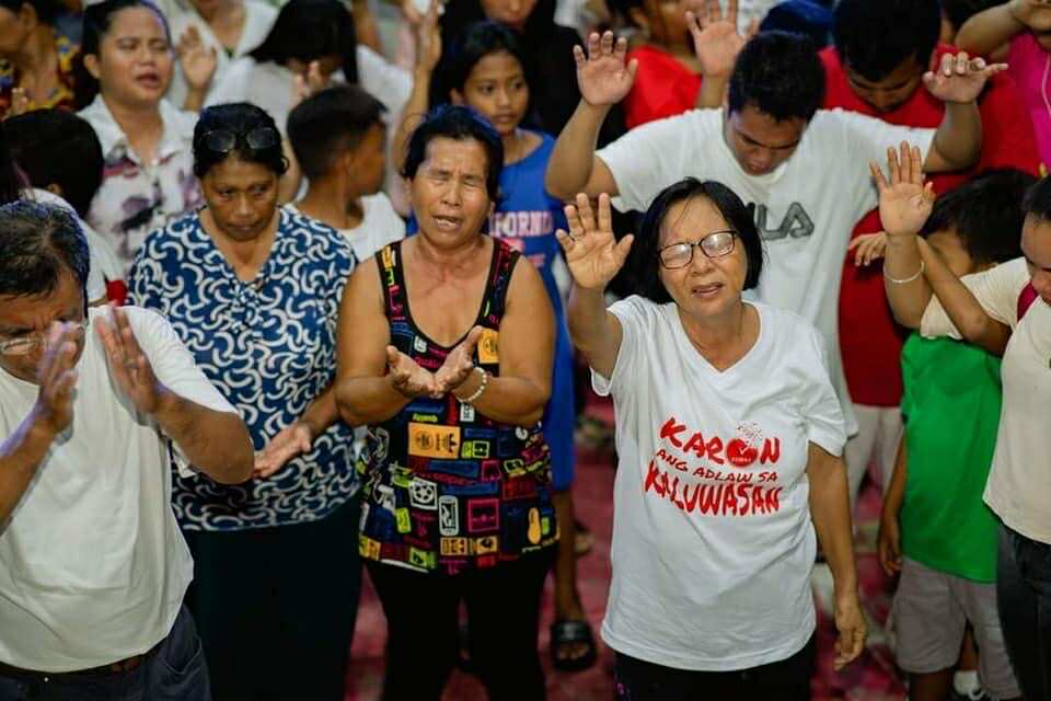 Community members in worship
