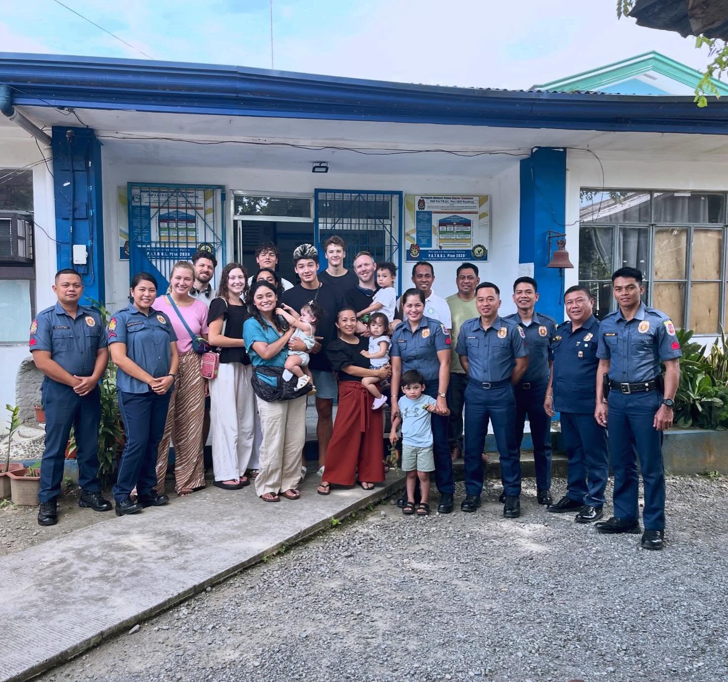 Mission team with community members
