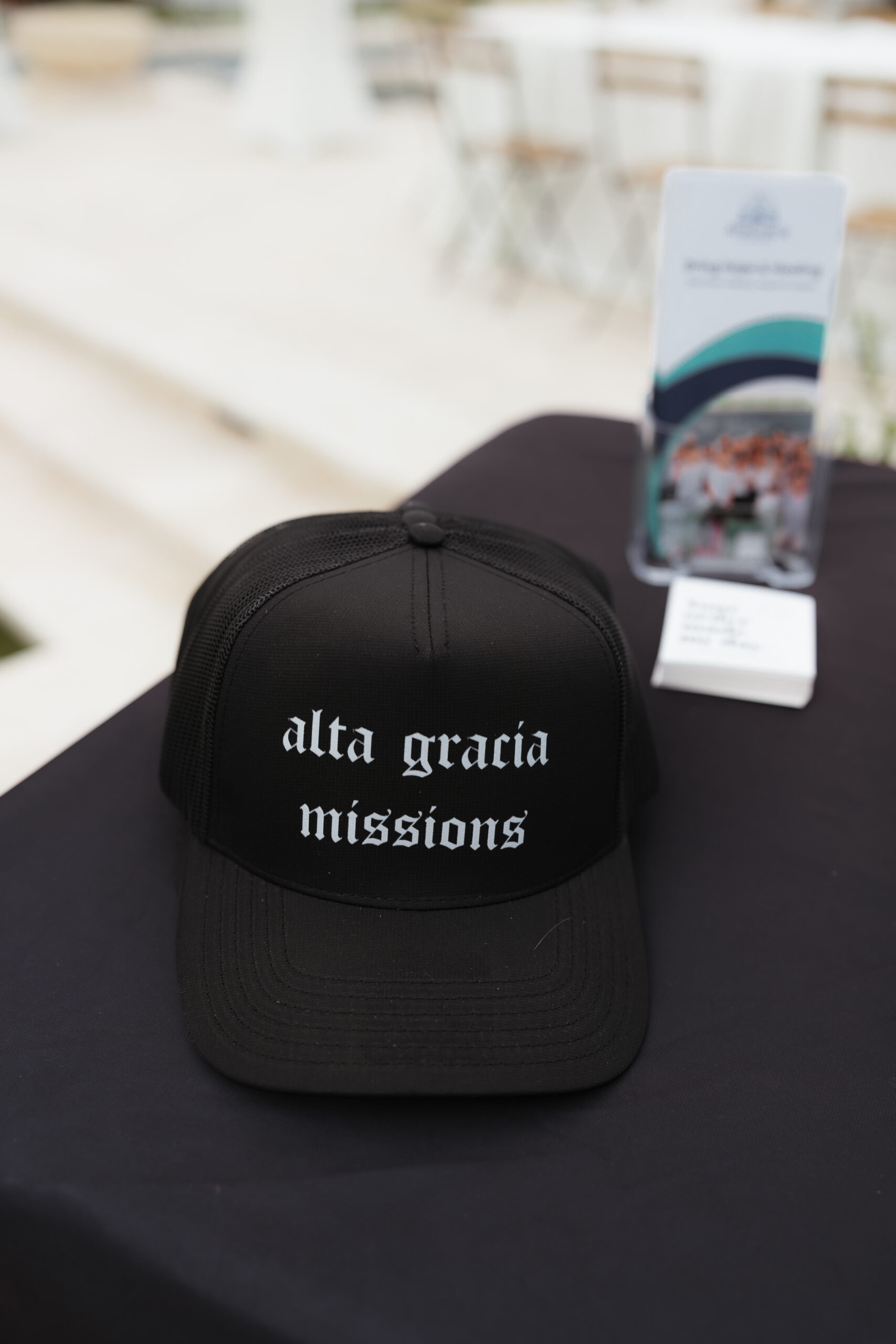 Alta Gracia Missions hat and brochure